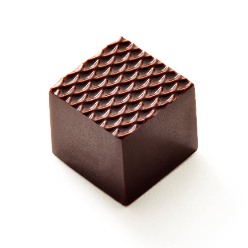 A single square dark chocolate piece with a textured, dimpled top surface, shown on a clean white background.